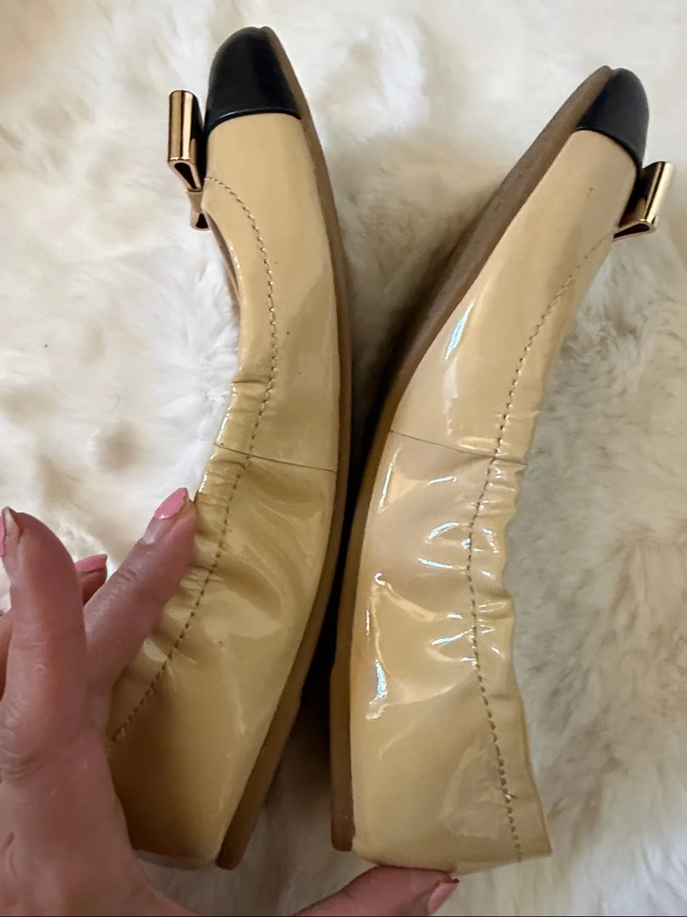 Coach Two-Tone Patent Leather Ballet Flats in Beige and Black with Gold Bow